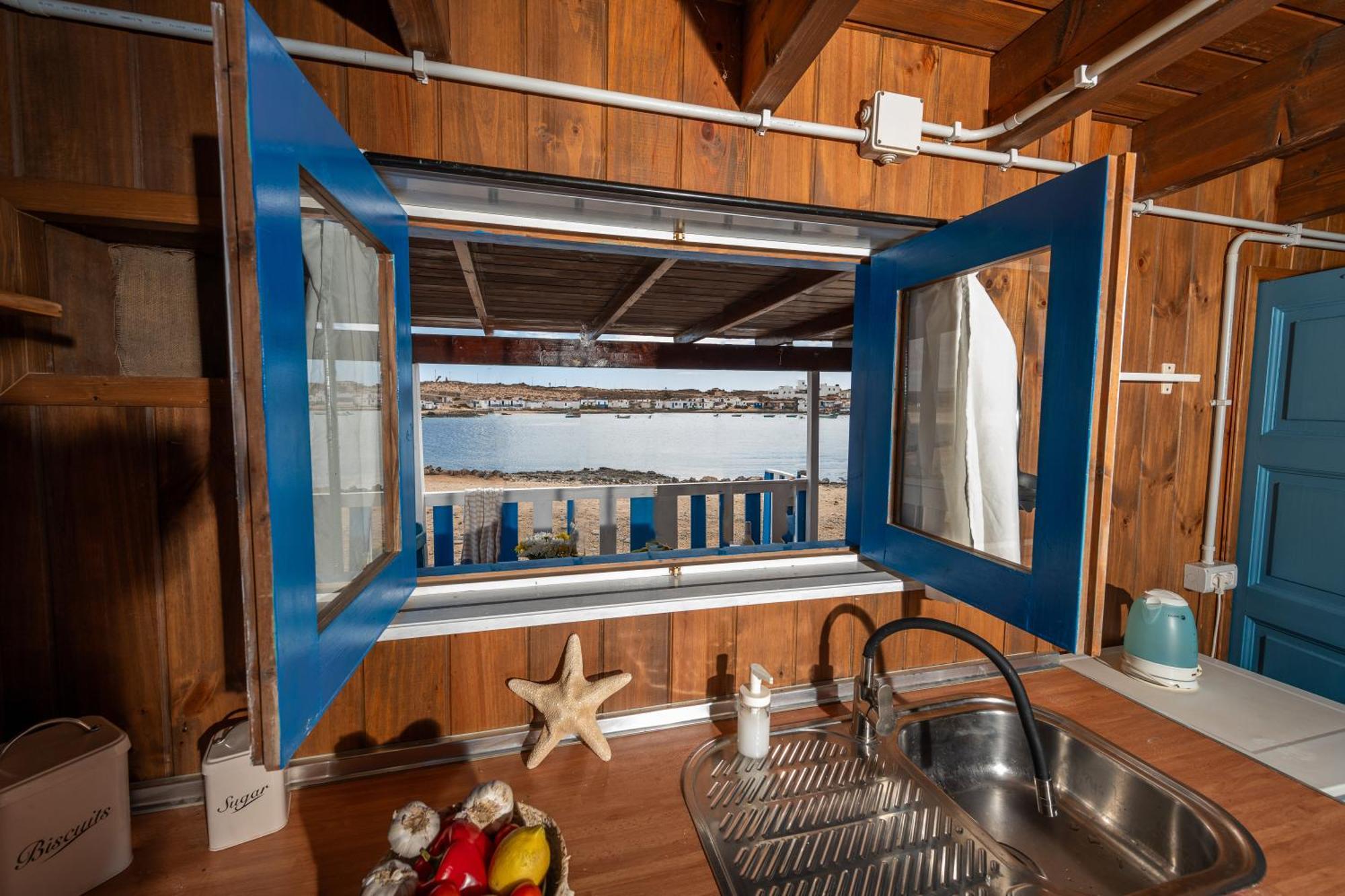 Cabin In Front Of Idyllic Majanicho Beach Exterior photo